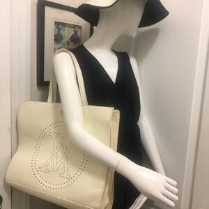 Amiani beautiful cream color late bag